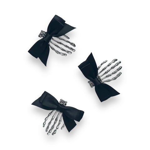 Small Black Bow Skeleton Hand Hair Clip