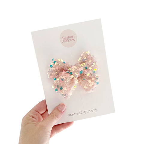 Iridescent Sequin Nude Pinwheel Bow