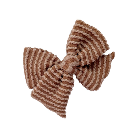 Camel waved rib knit pinwheel bow